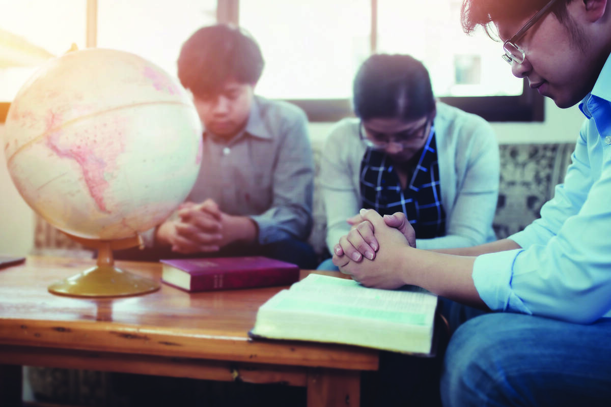 people praying together