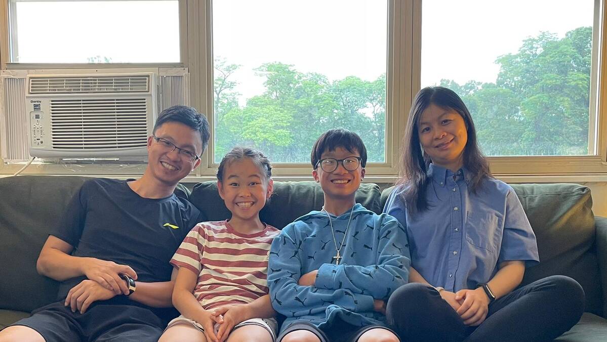 Sansan Shan with her family in their apartment on Trinity's campus.