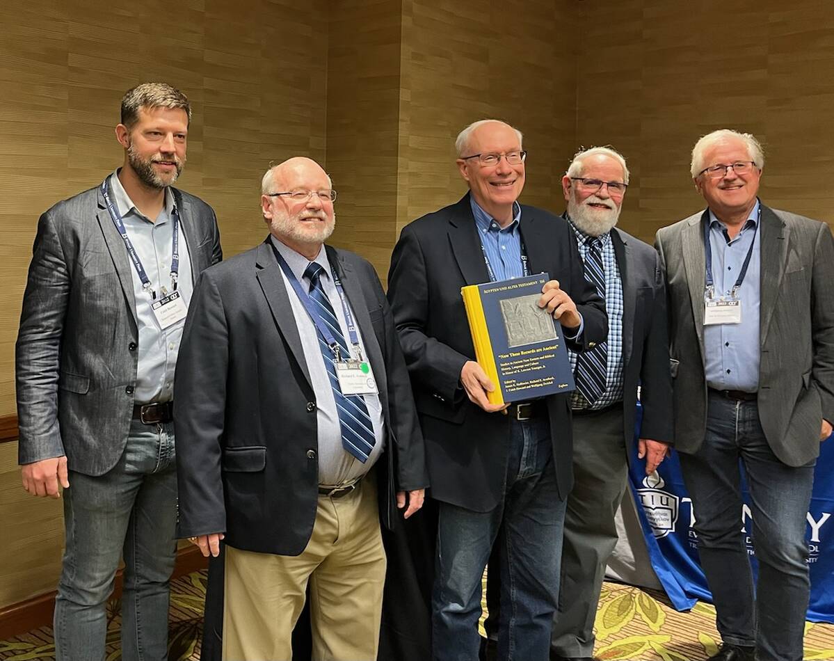 Dr. Lawson Younger, Jr. stands with the four main editors of his festschrift.