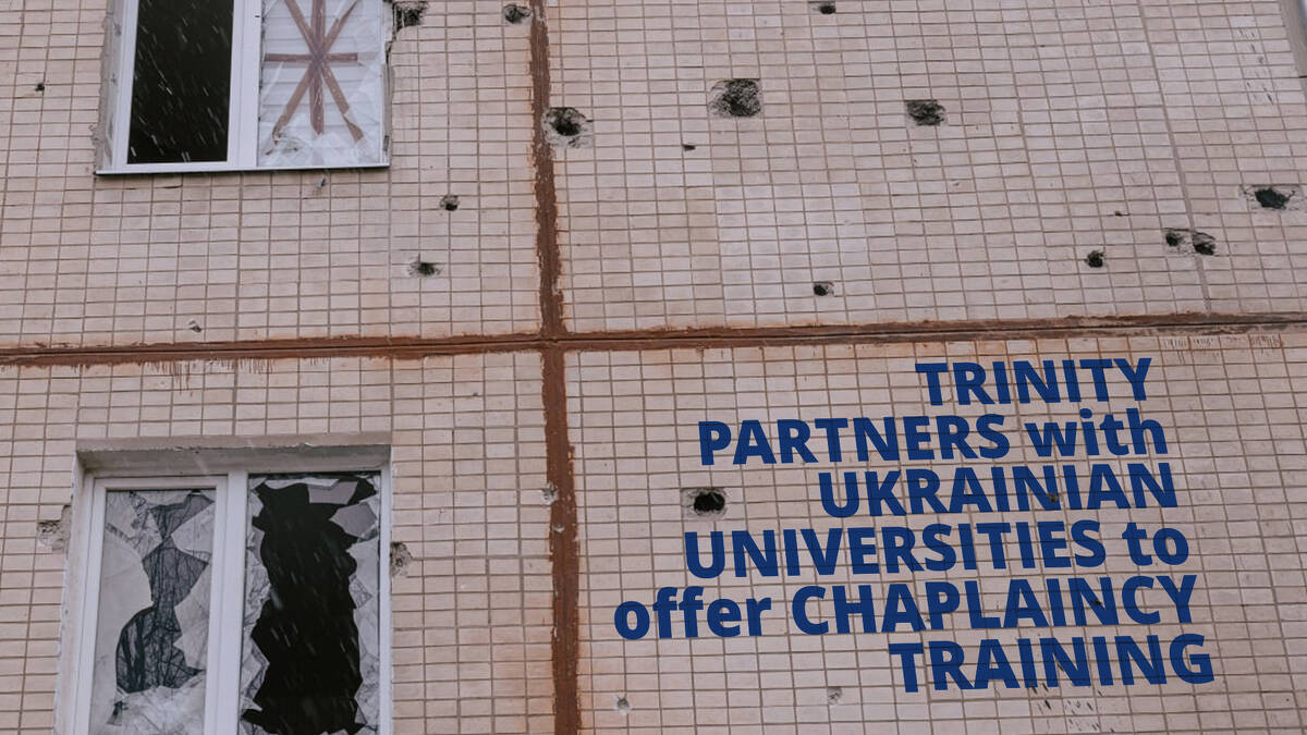 Building with shattered glass and shrapnel in the bricks in Ukraine