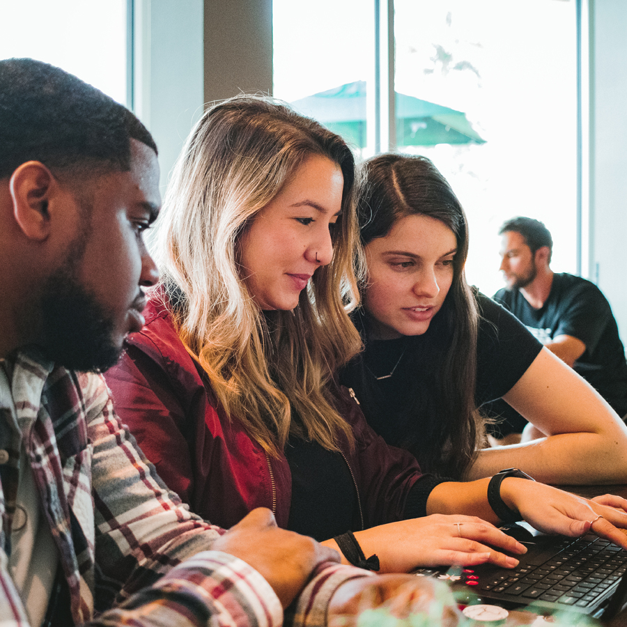 Group works on computer together